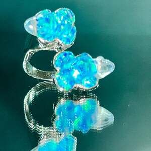Exquisitely carved 12.15 carat Blue opal Quartz Twin Frog ring